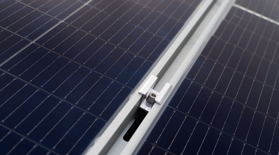 What should we focus on when selecting a fixing system for photovoltaic modules?